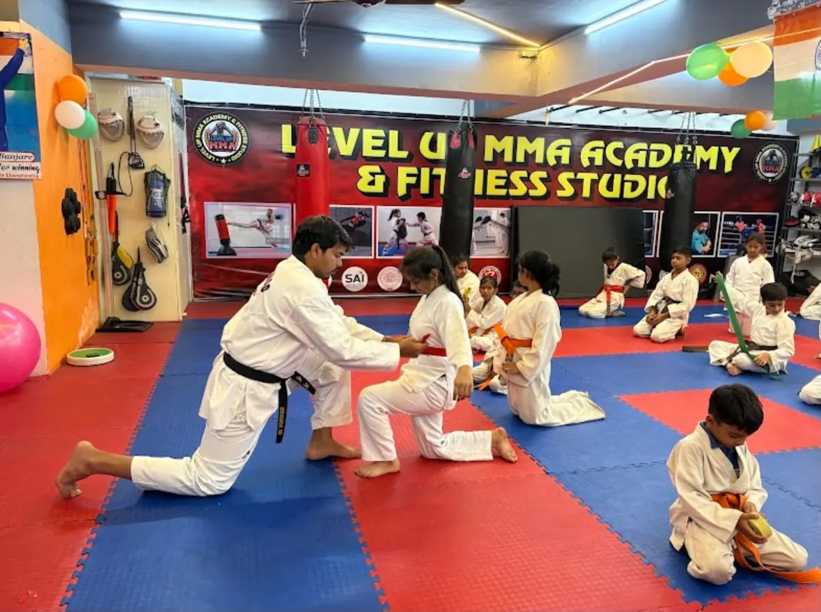 Kids practising techniques in pairs