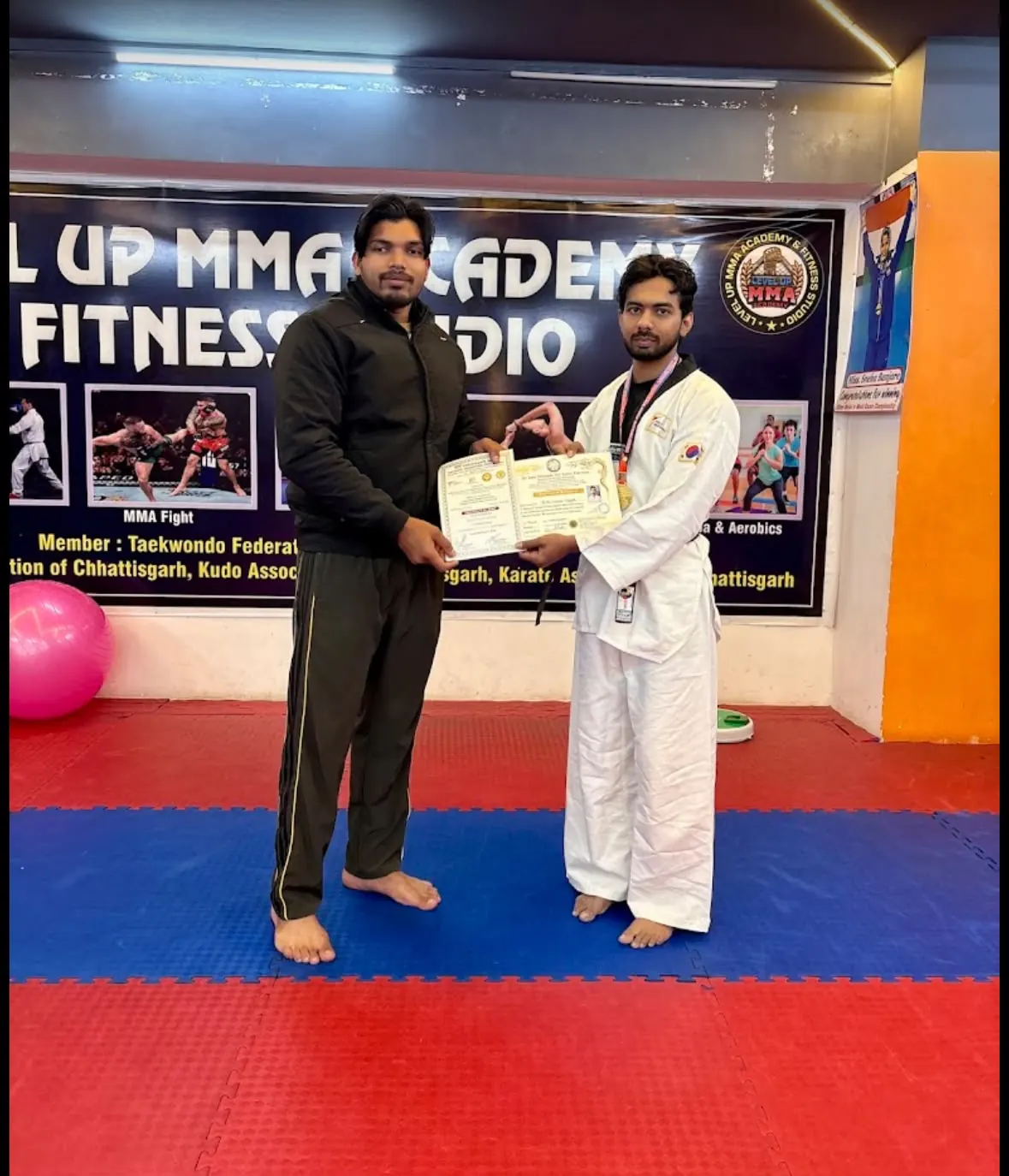 Certificate being presented to a student